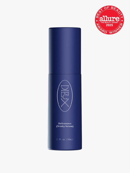 Dieux Deliverance navy serum bottle on light gray background with red Allure Best of Beauty seal in the top right corner